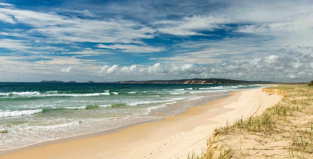 A sandy beach with sand dunes in Queensland.