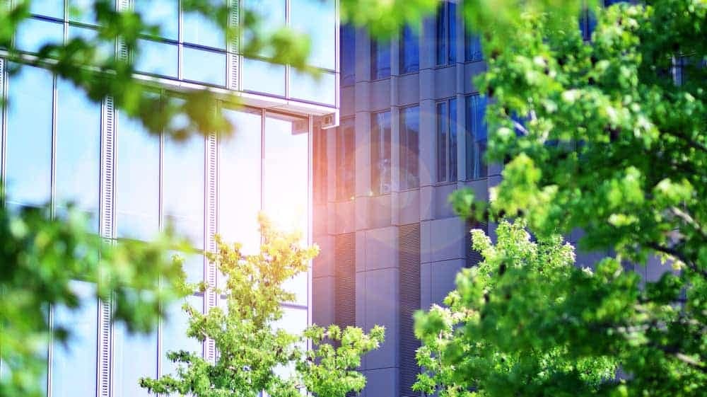The sun is shining through the glass of a building at the CAMPOUT Event, showcasing Green Camping Technology.