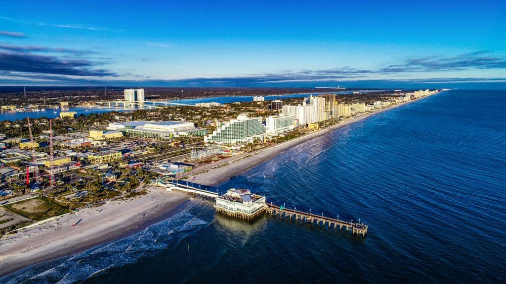 An aerial view of the beach and city showcasing the Florida RV Park and Campground Associations.