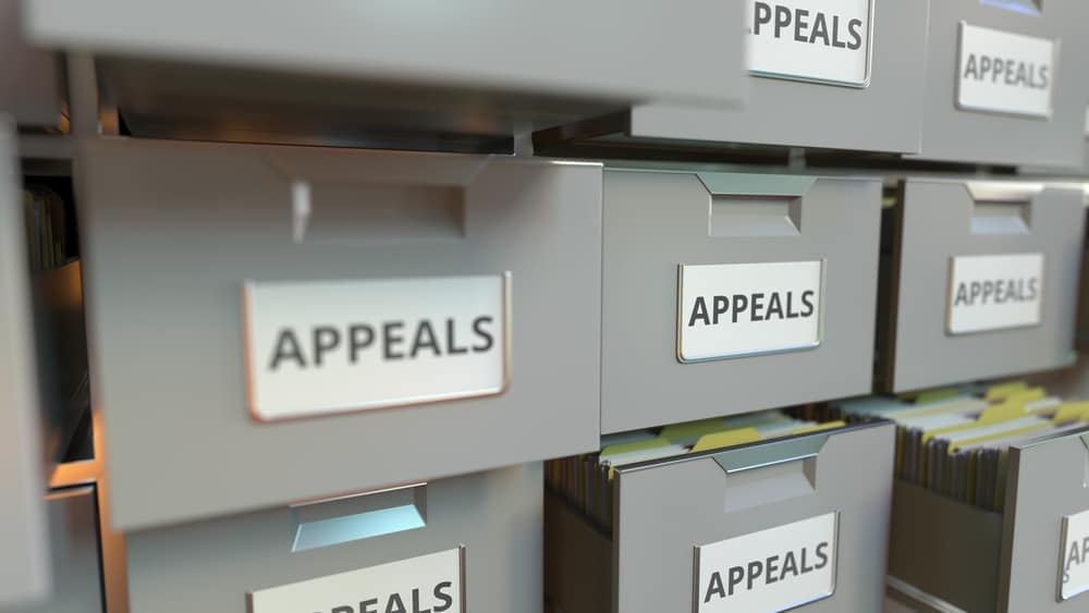 A stack of files containing Glampground Appeals documents.