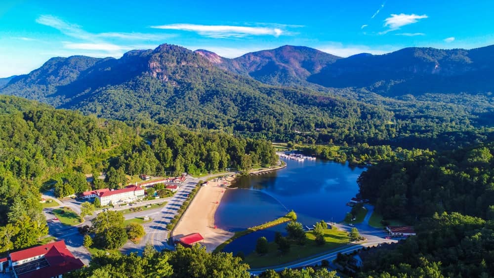 North Carolina State Parks has made significant improvements to this lake surrounded by mountains, showcasing its commitment to land acquisition and preserving natural beauty.