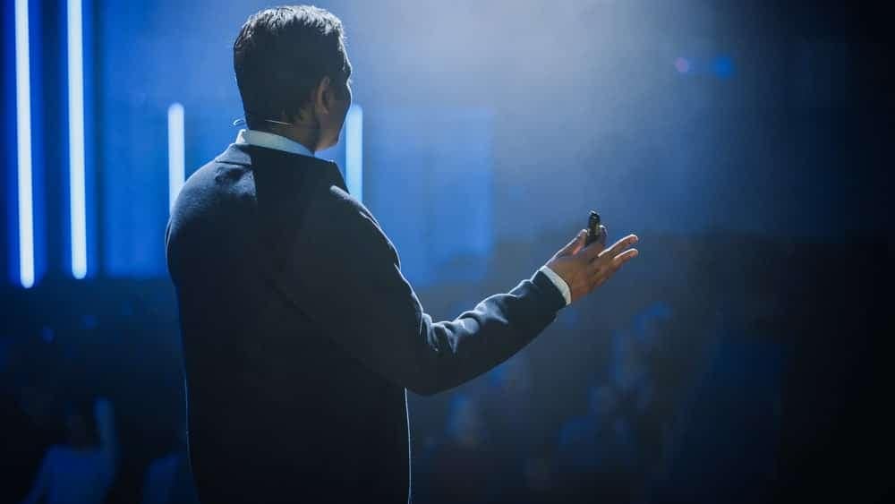 A man is giving a presentation at the RVIA Leadership Conference in 2023.