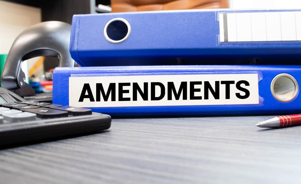 A blue binder with the words RV Park Proposal on it.