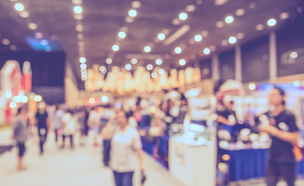 A blurry image of a crowd at the RV Dealers Convention/Expo.