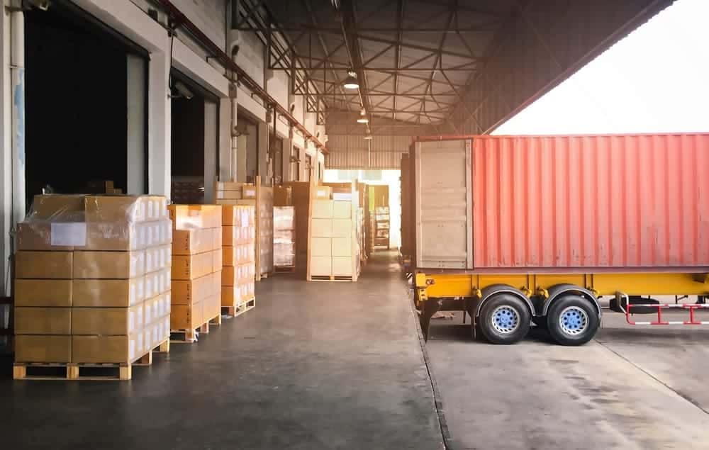 A container truck is parked in a warehouse, ready to record RV shipments during its second best year.