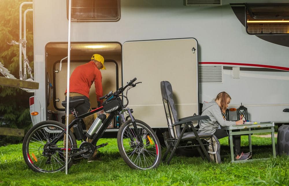 A premium RV insurance sales increased after Roamly released an appealing advertisement featuring an RV with a couple of people and a bicycle in front of it.