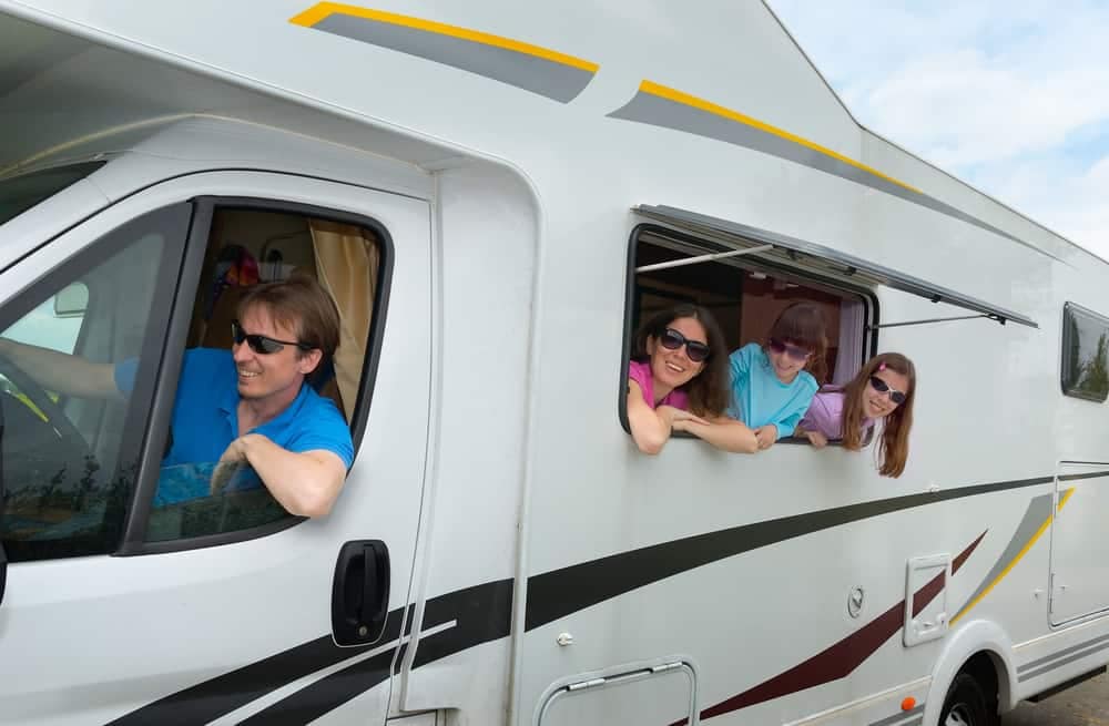 Members of Escapees RV Club gathered in Tennessee, eagerly peering out the window of an RV during the 61st Escapade.