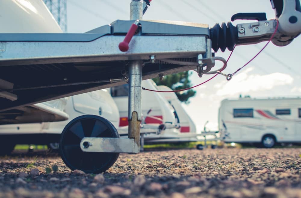 A group of RV trailers parked next to each other in Alberta, following the regulations of the Municipal Planning Commission. The RV Storage Permit ensures compliance with local guidelines for storing and parking recreational vehicles in