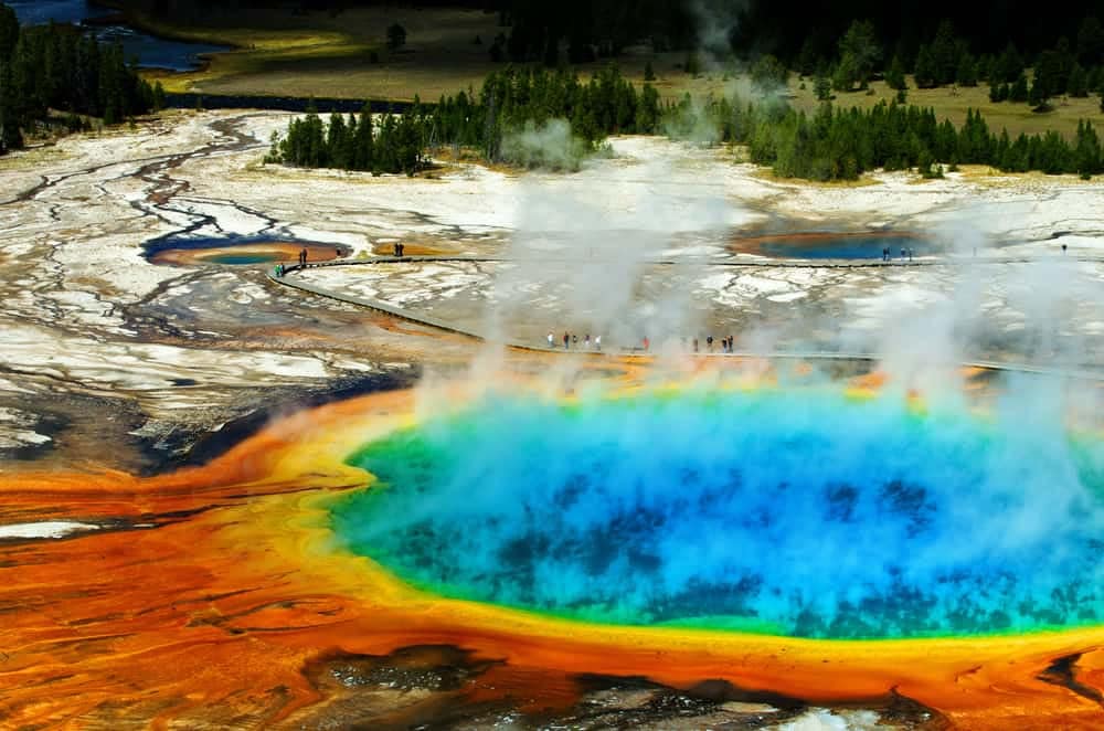 An aerial view of a colorful geyser in Yellowstone.