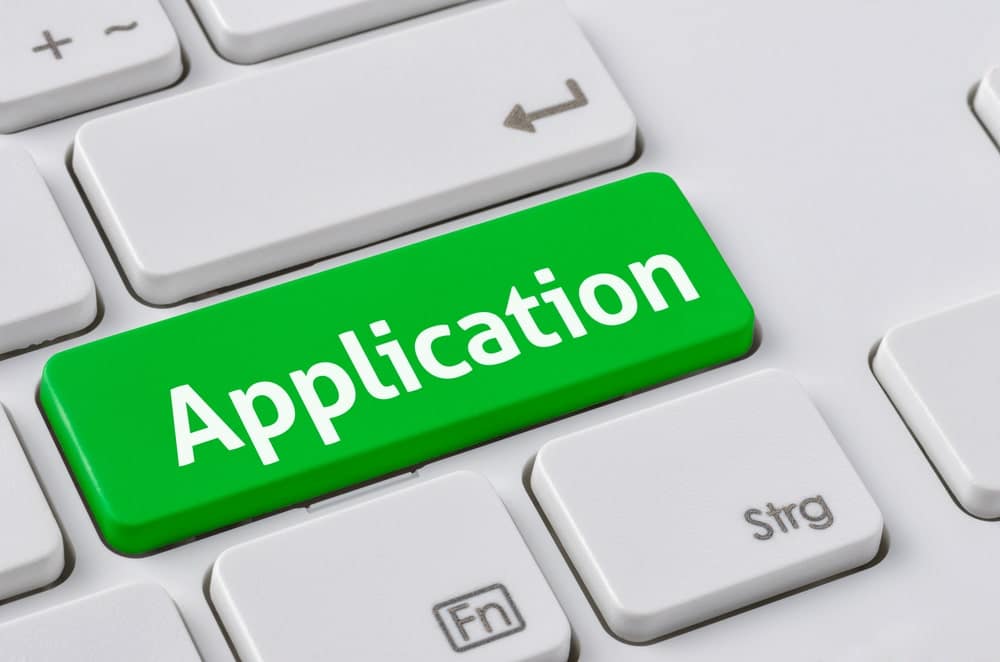 A renewed rezoning application for the owners of Saratoga Speedway, featuring a green button with the word application on it.
