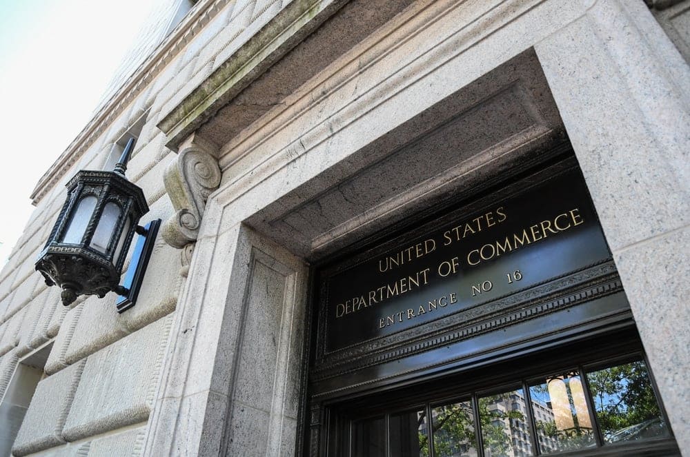 The entrance to the United States Department of Commerce, a central location for monitoring and analyzing the health and growth of the US economy.