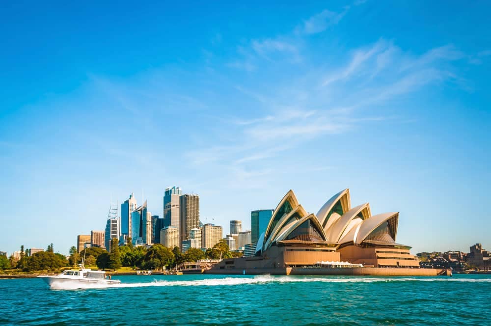 The Sydney Opera House is seen from the water, enhancing its allure and boosting tourism in China.