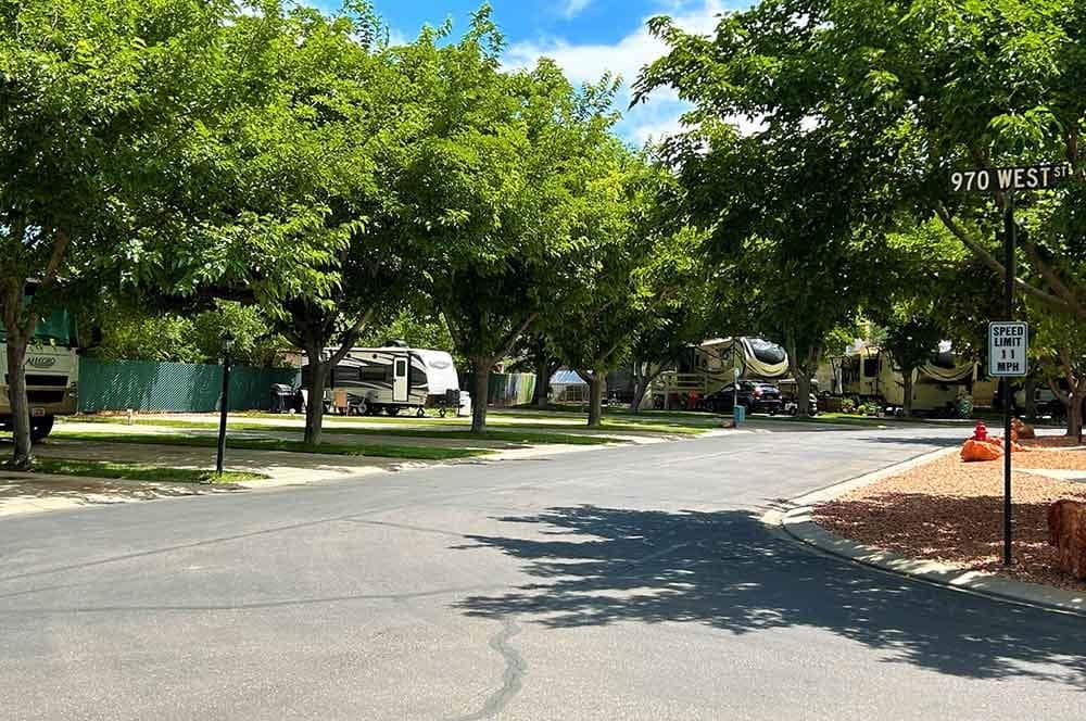 WillowWind RV Park, nestled among trees, offers a serene campground experience with parked RVs.