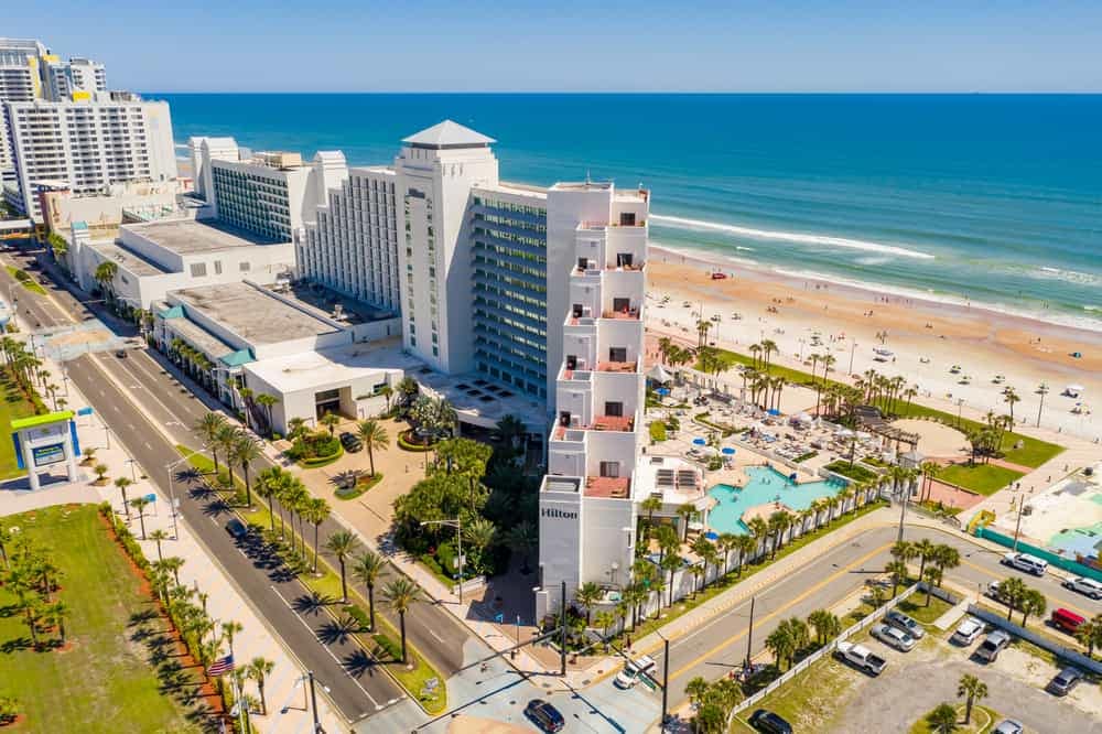 An aerial view of the beach and hotel in Florida.