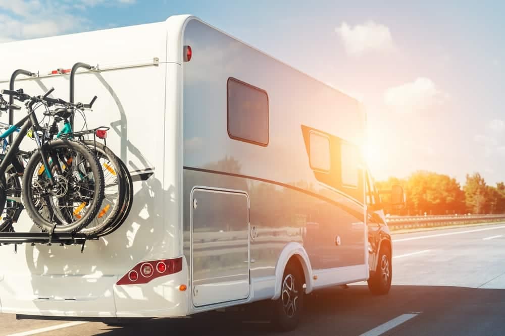 Planning a white rv travel with bicycles on the back of it is easier now with our mobile app.