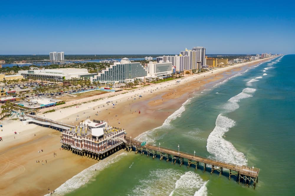 An aerial view of the beach and pier in Florida.