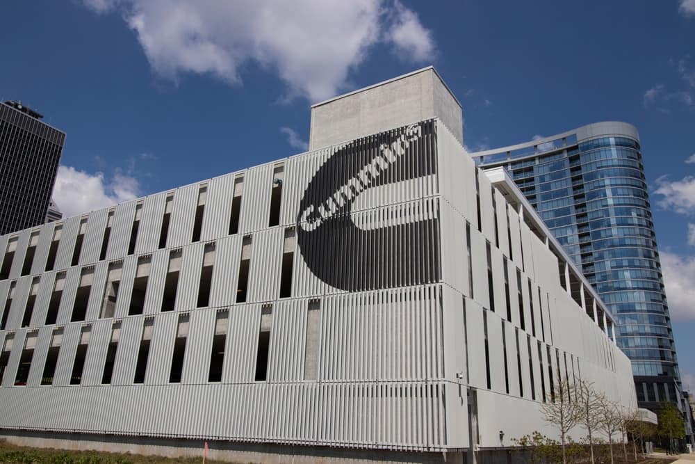 A large building with a Lithium Metal sign on it.