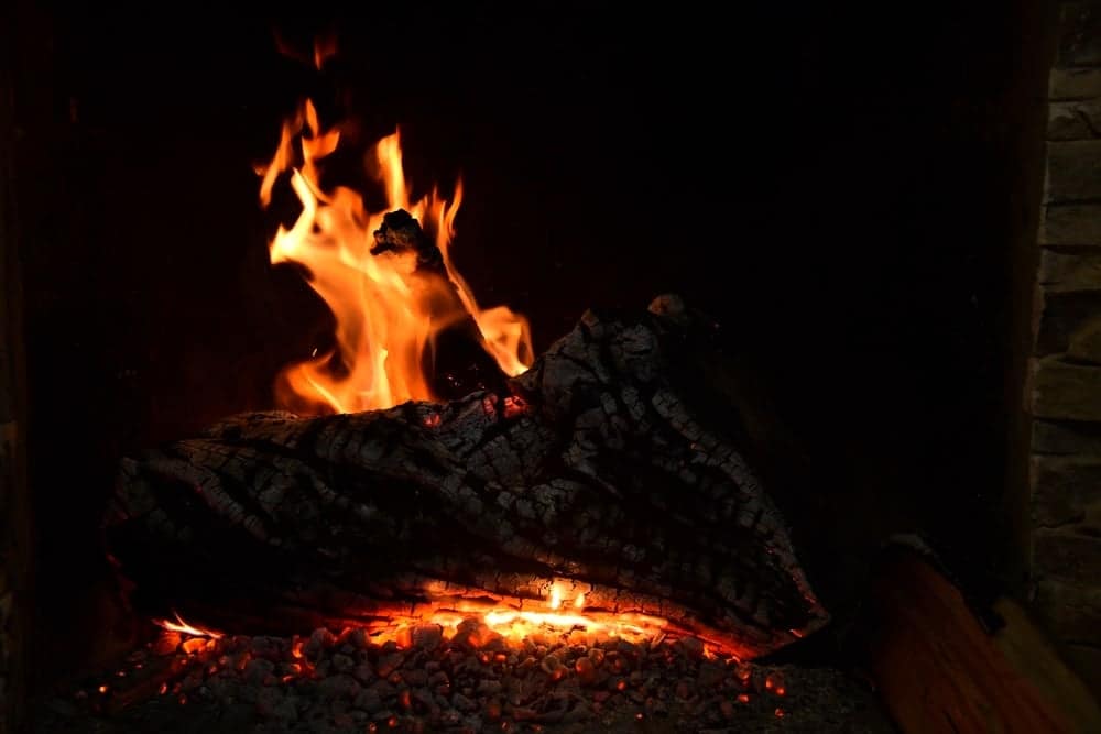A fire burning in a fireplace.