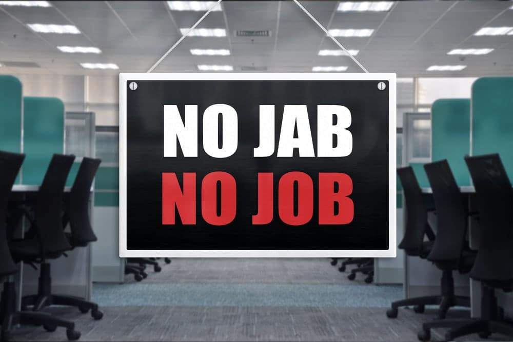 A job sign hanging in an office undergoes an overturn.