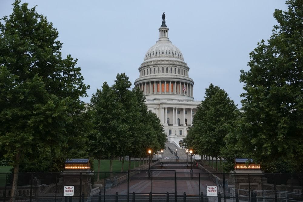 The proposed bill aims to prevent catalytic converter theft in the United States Capitol building seen at dusk.