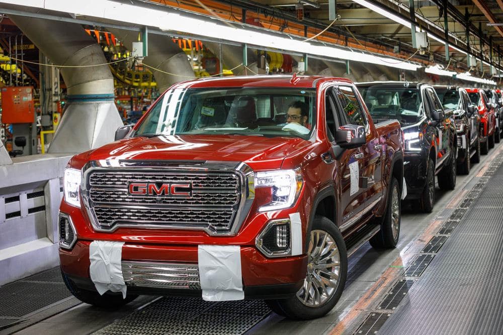 General Motors' assembly line sees a production increase of 2020 GMC Sierra trucks, including the new EV truck model.