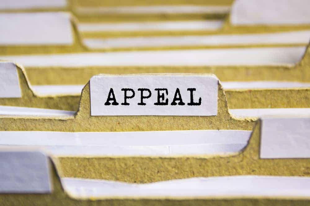 A file folder with the word appeal on it.