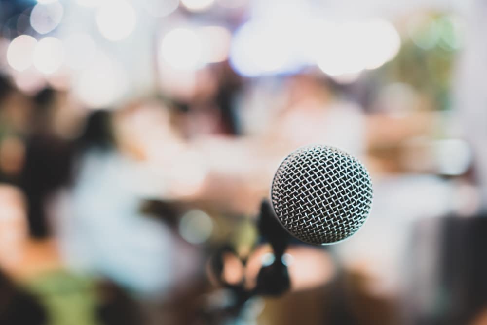 A microphone in front of a Preston RV Park.
