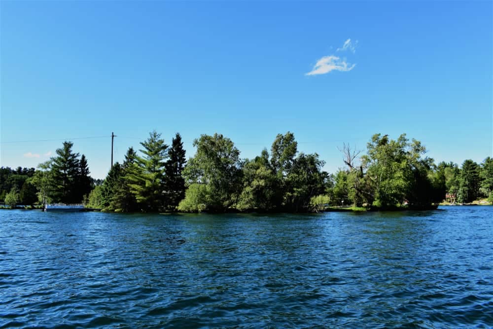 A small island in the middle of a body of water, proposed for a campground rezone.