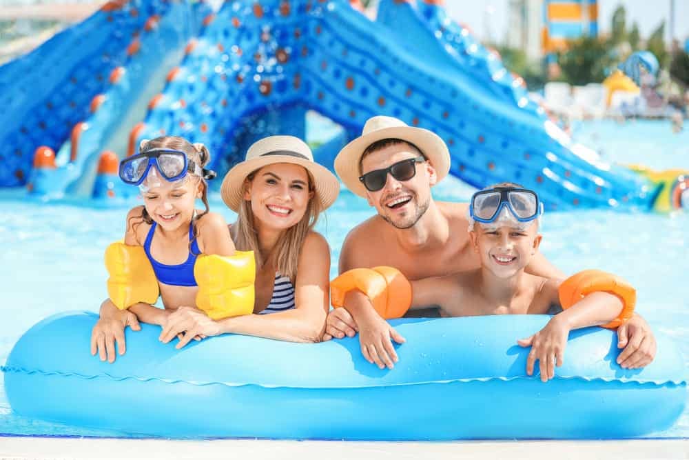 Family having fun at the Jellystone Park water park in New Hampshire.