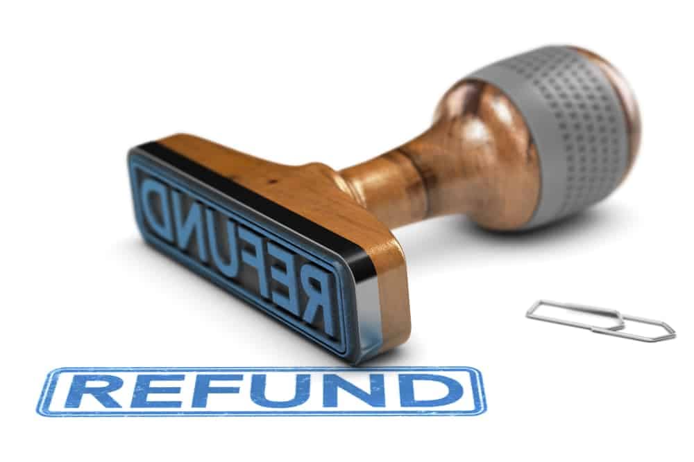 A rubber stamp with the word refund on it, perfect for campers in Manitoba seeking compensation.