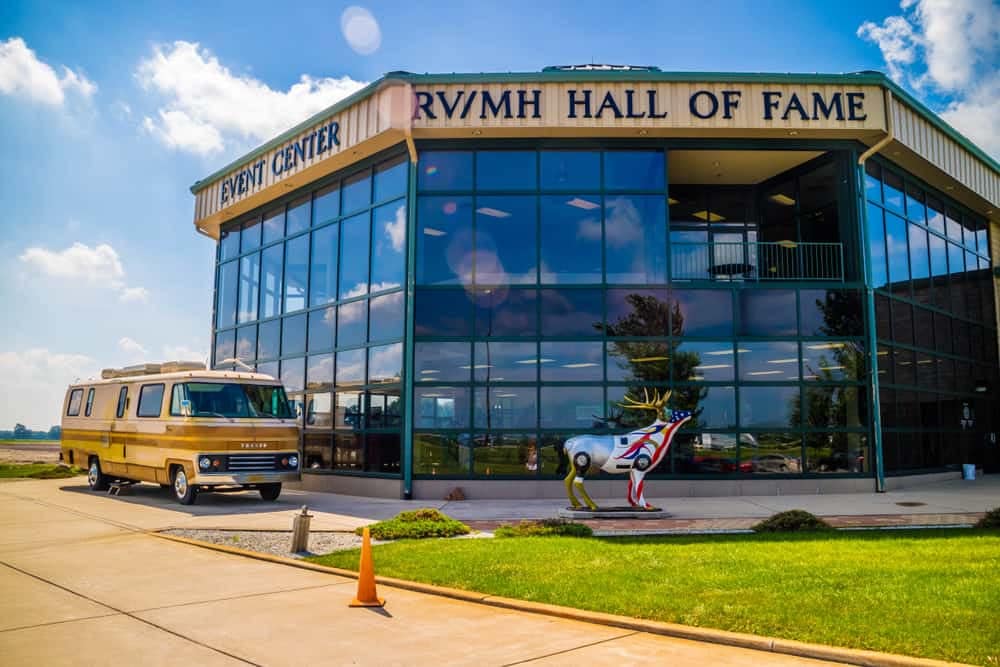 A pandemic-delayed RV parked in front of the Ryan Hall of Fame, purchased from an Elkhart RV dealer.
