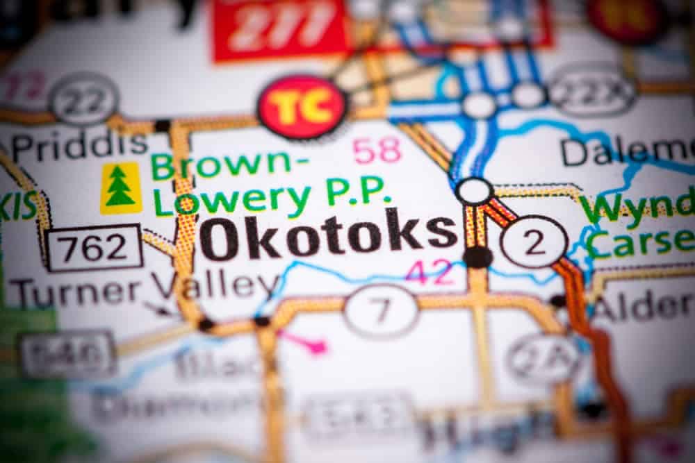 A map of Okotoks showing nearby campgrounds during busy season.