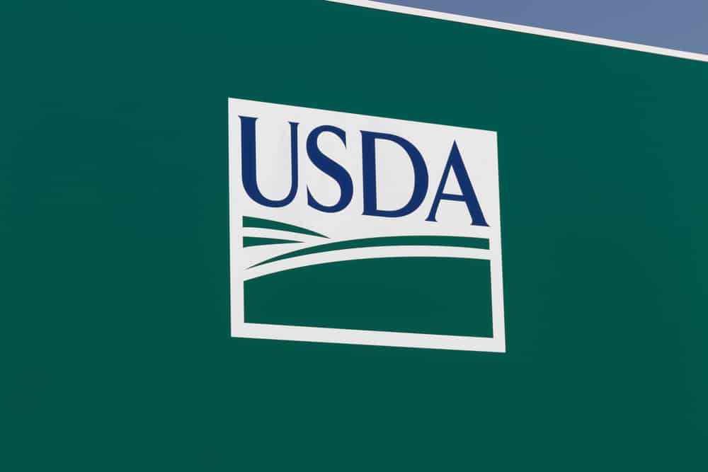The USDA logo is prominently displayed on a green sign, symbolizing the agency's commitment to conservation and outdoor recreation.