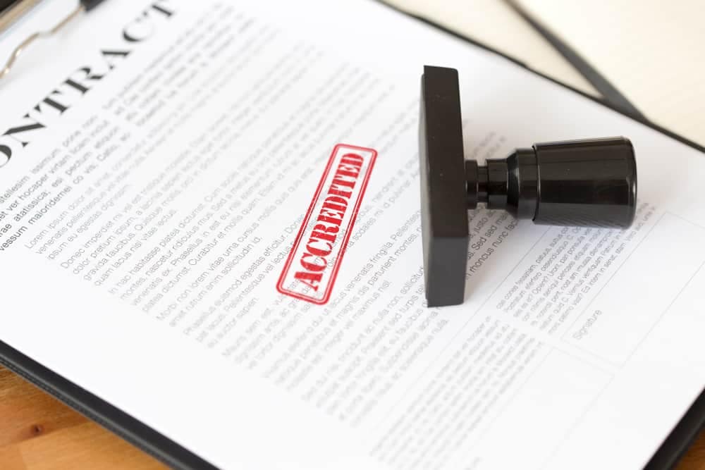 A contract with a rubber stamp on top of it, provided by NSW Dealership.