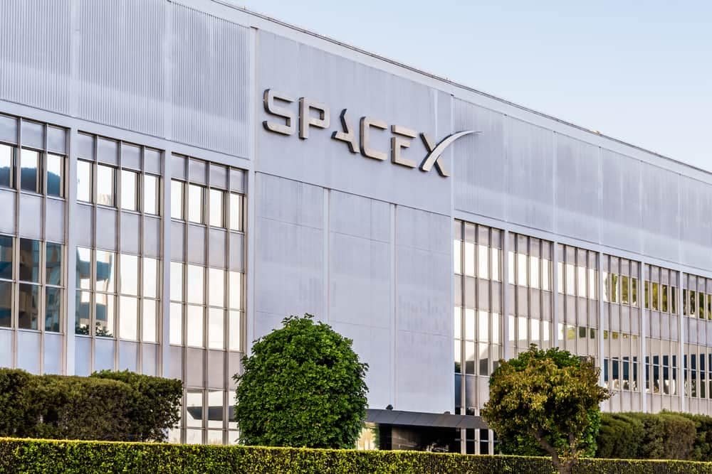 A building displaying the word SpaceX, hosting the FCC-approved Mobile Starlink Internet Service.