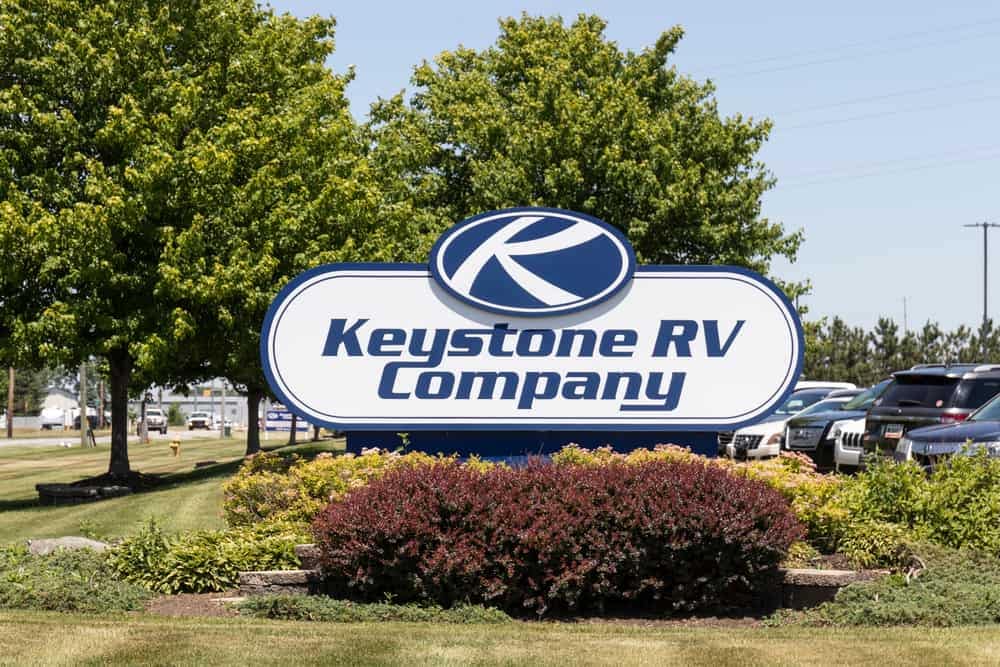 Keystone RV company sign in front of a parking lot in Goshen.