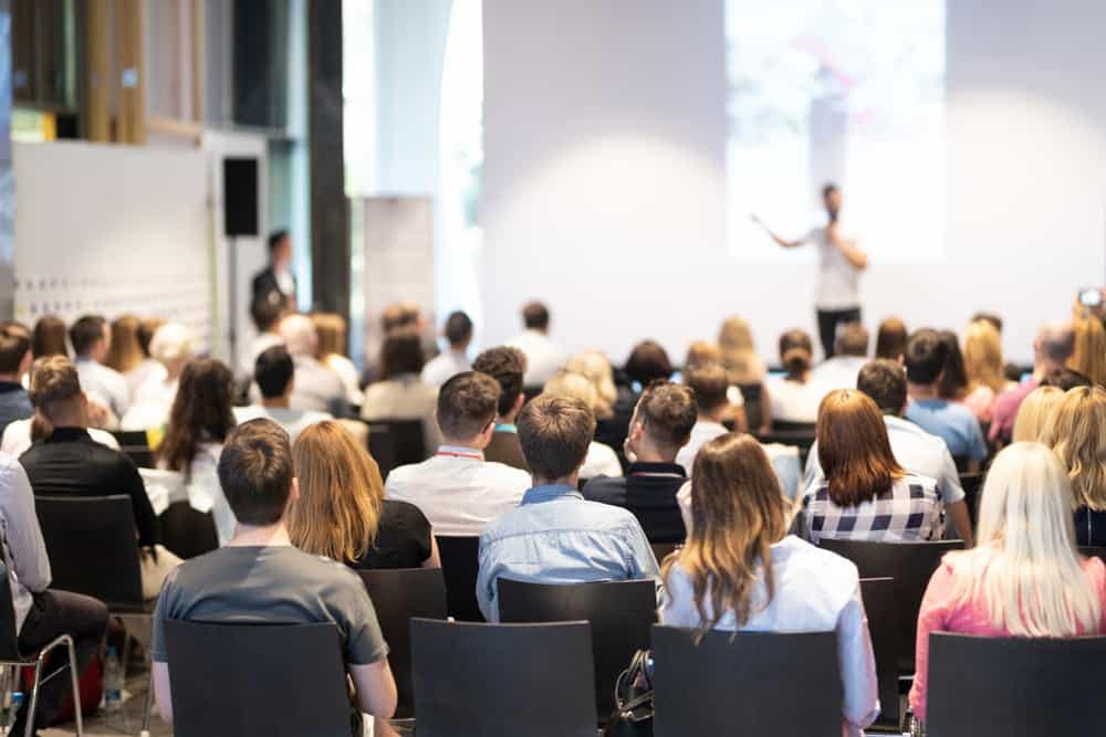 Attendees at the 2022 RVDA Convention gathering in an auditorium to learn about effective Employee Onboarding Strategies.