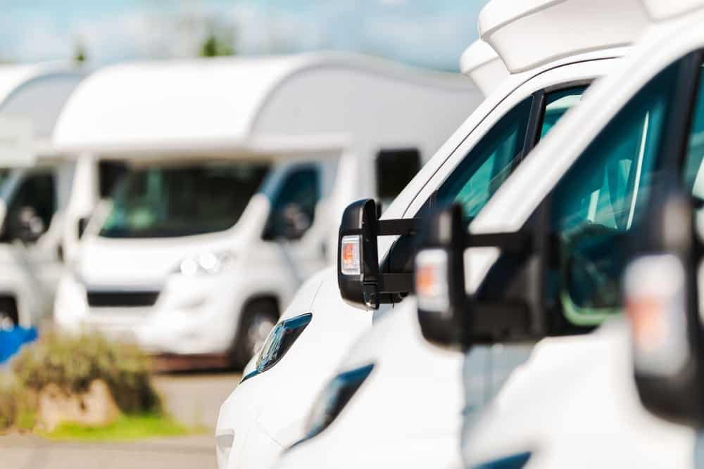 A row of white RVs parked next to each other in the East Coast Region, Malaysia's RV Industry Hub.