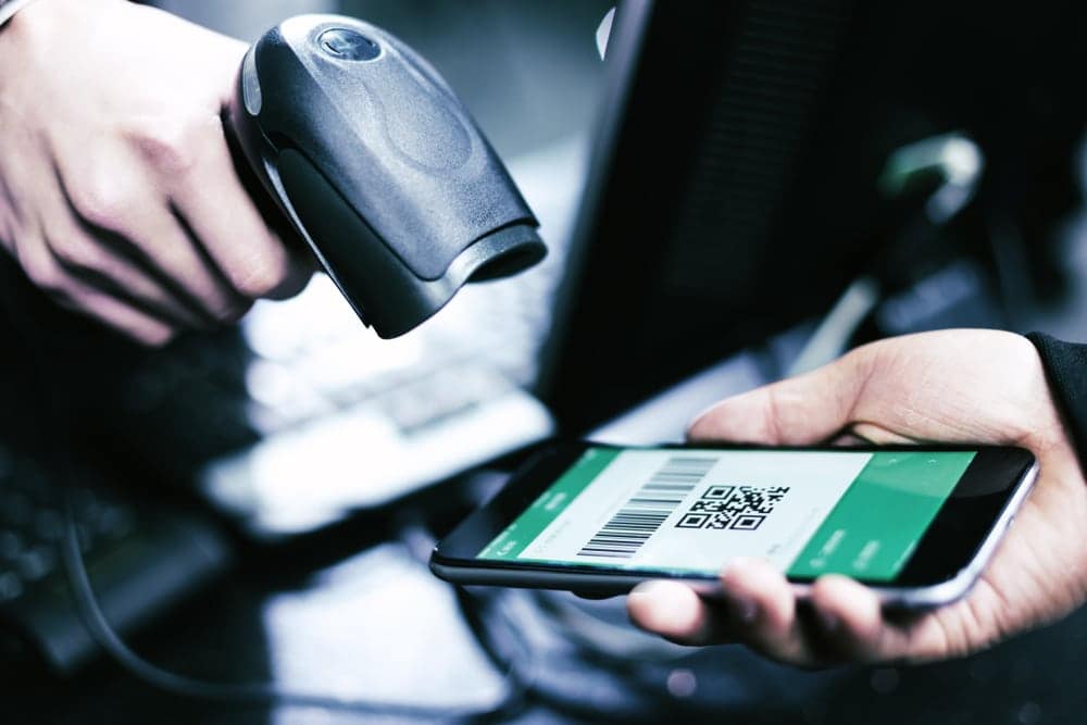 A person is using a smartphone to scan a qr code for cashless starting June at Rocky Mountain National Park.