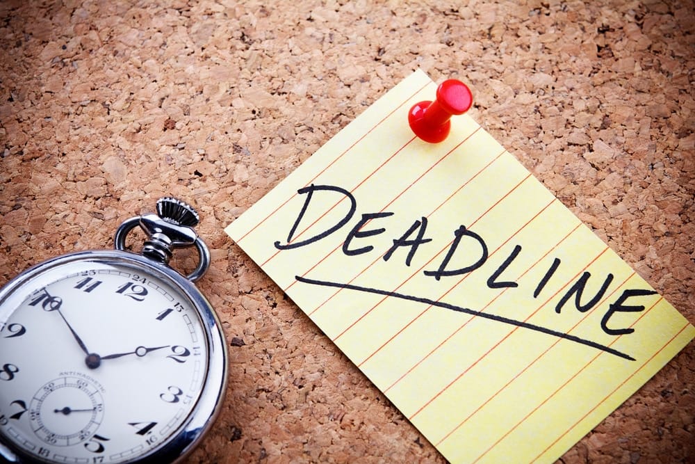 A controversial note with the word "deadline" next to a clock.