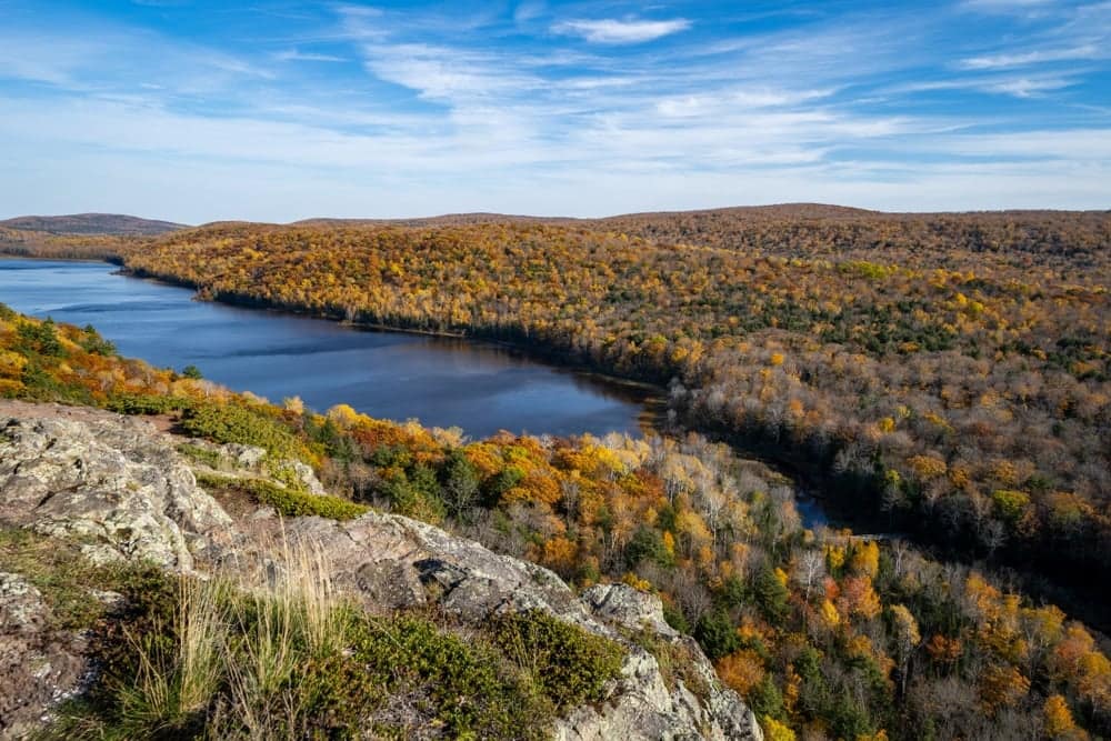 An ARPA-Funded project showcasing a picturesque mountain view and serene lake in the beautiful fall season of Michigan.