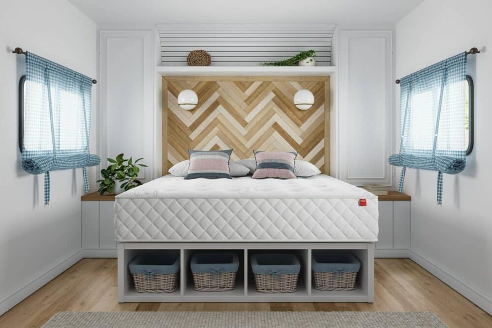 A bed in a small bedroom with a wooden headboard and a Certi-PUR Certified mattress.