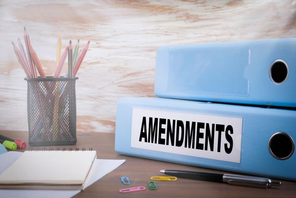 A stack of blue binders with the word amendments on them at a Minnesota campground.