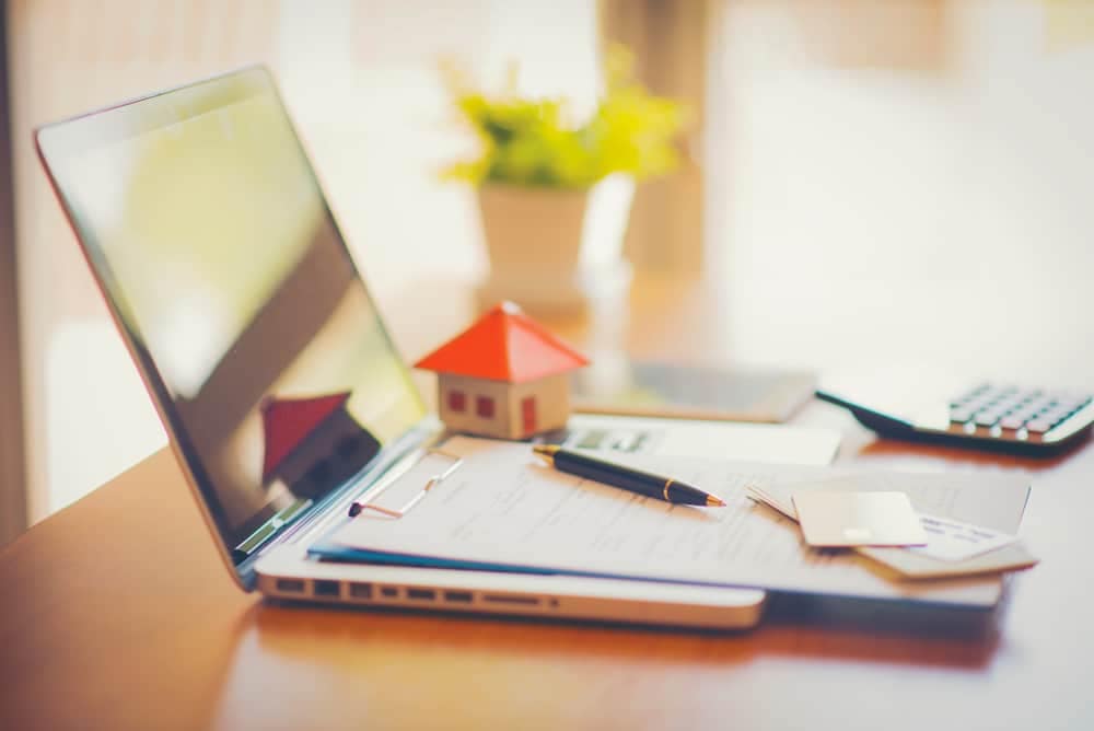 A laptop on a desk.