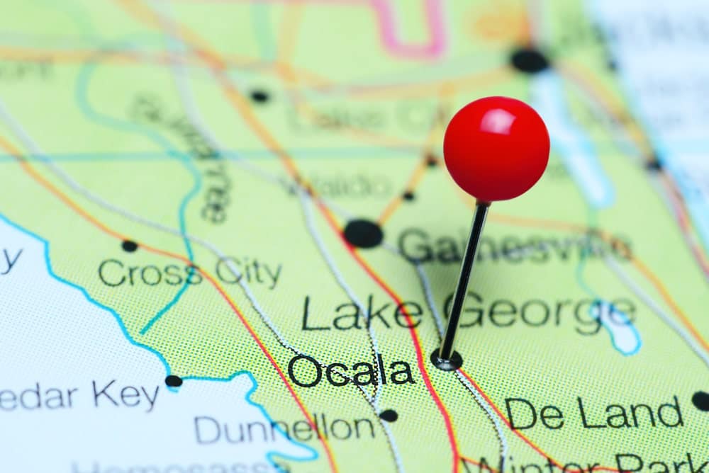 A pin is pinned on a map of Osceola, Florida at Sunlight Resorts.