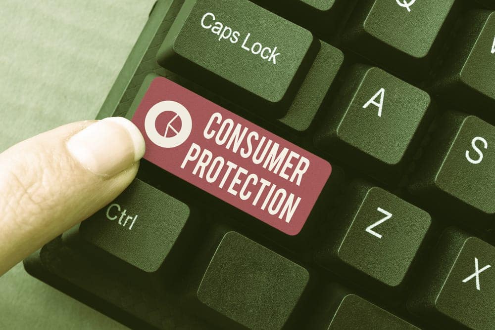 Good Sam launches a Consumer Protection Program, featuring a person pressing a button on a keyboard labeled "consumer protection".