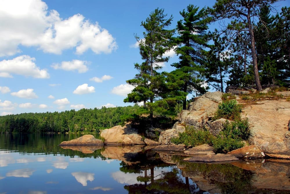 Algonquin Park's lake, surrounded by rocks and trees, undergoes upgrades and repairs worth CA$3.3M.