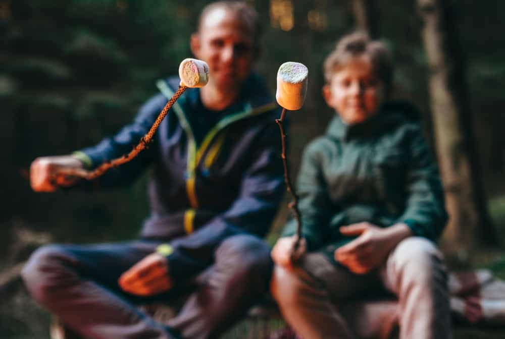 Americans camping in the woods.