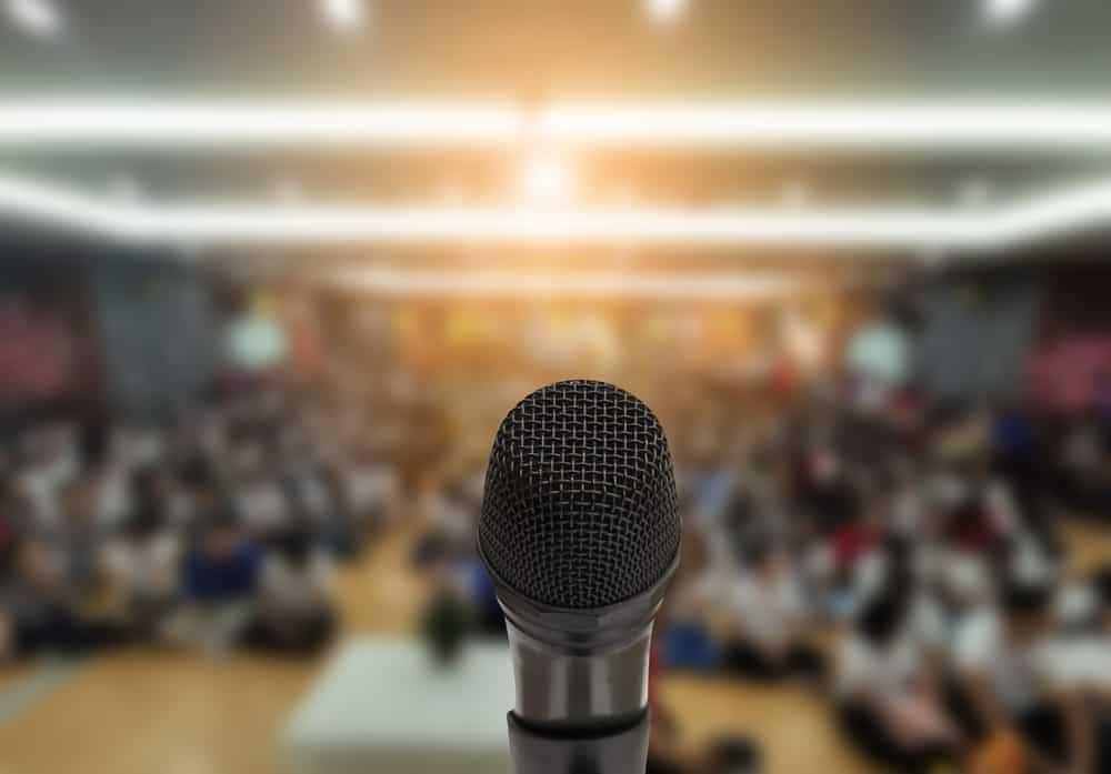 A Mid-Atlantic Conference microphone capturing the opportunity for individuals to learn and network within a crowd of people.