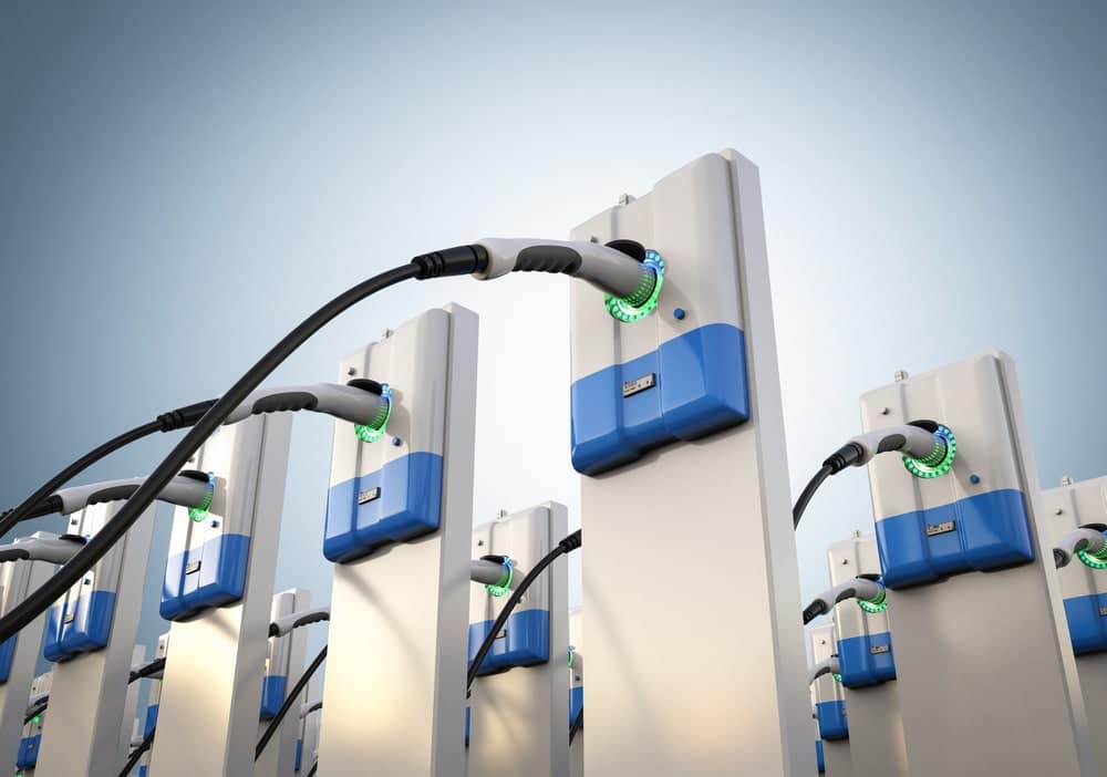 A row of state-of-the-art electric charging stations, enhancing the visitor experience and reflecting new tech advancements in infrastructure investments.